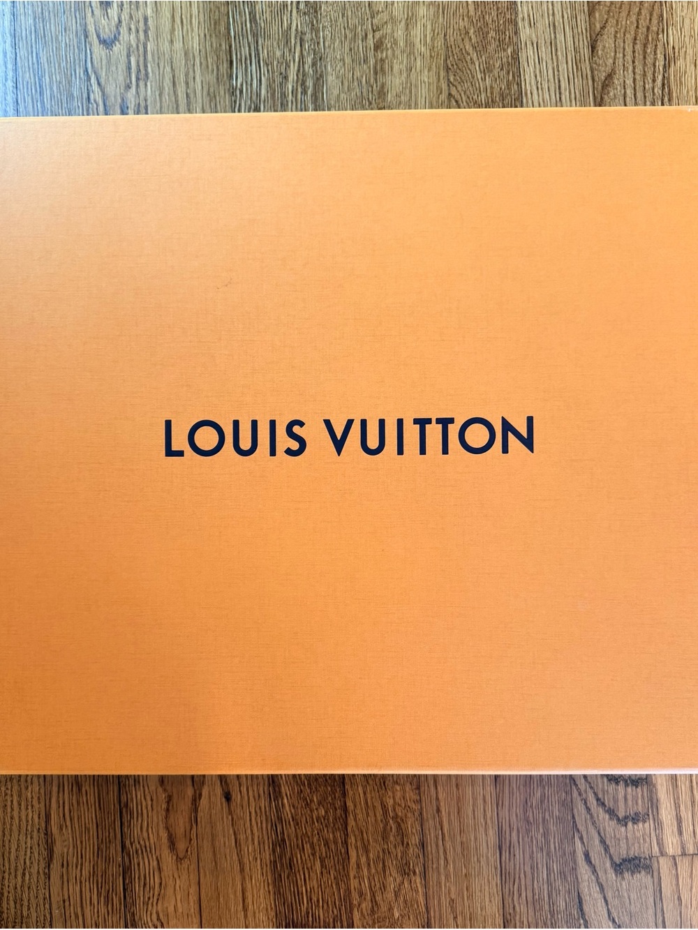 Authentic Louis Vuitton Orange Box and bag with Black Logo